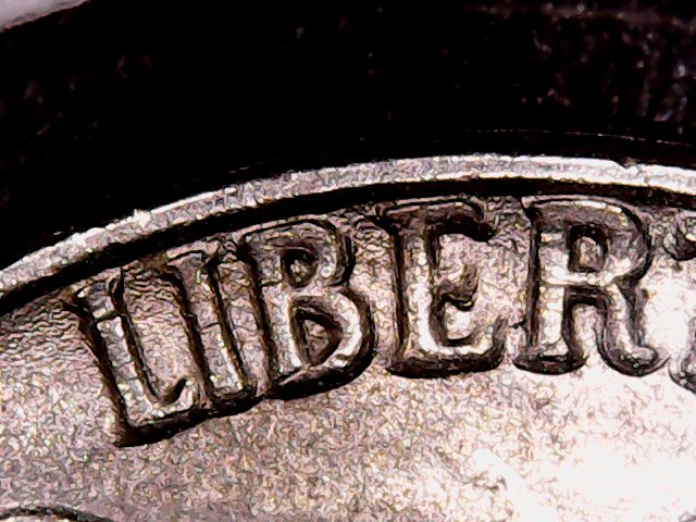 1961-Jefferson-Nickel---Machine-Doubling?