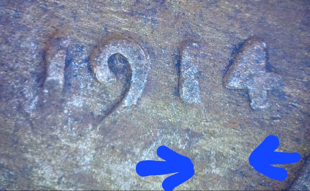 1914-Wheat-Penny.--Yes-Pareidolia.-But-Tell-Me-You-Don't-See-It