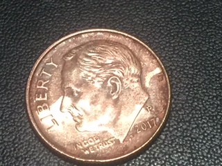 Clad-Error-Dime-From-A-Family-Member