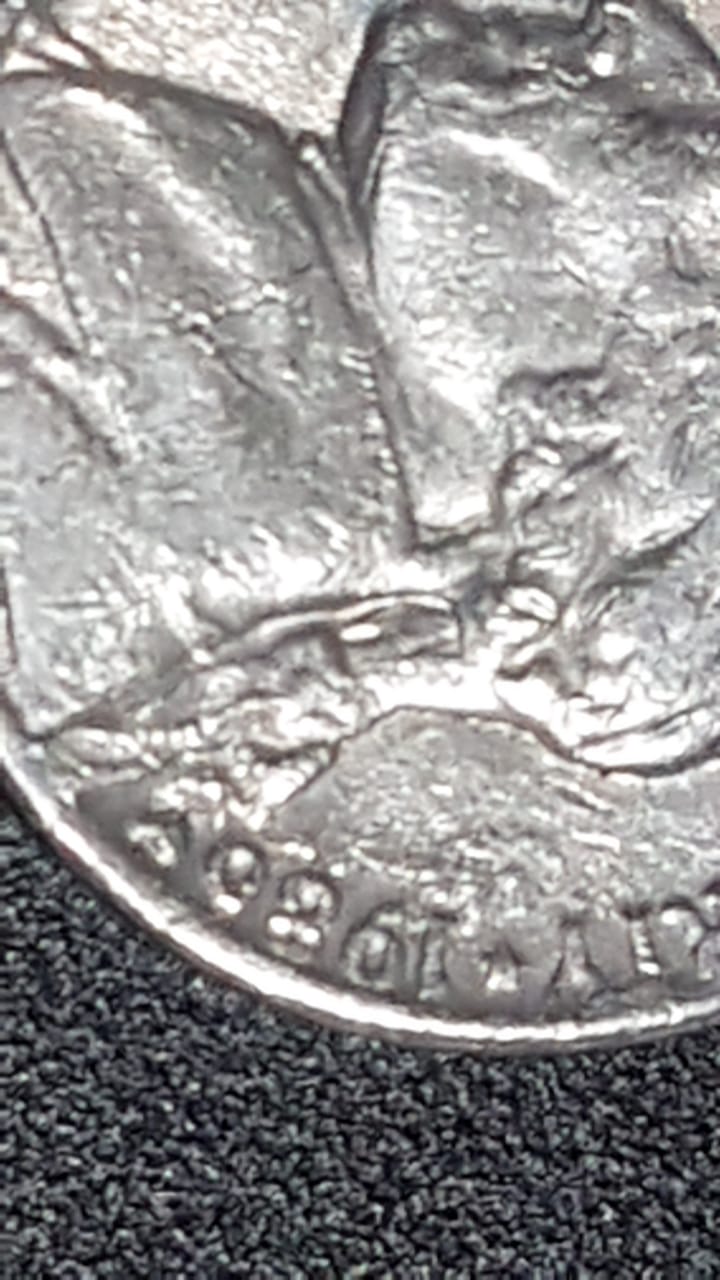 1986-P-Nickle-Looking-Strange