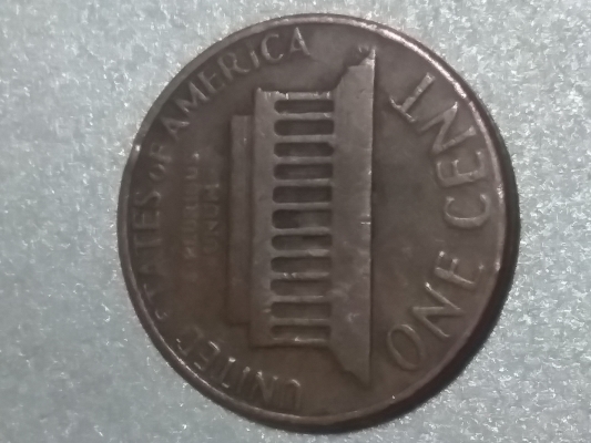 1974-Penny-Struck-Through-Grease-Or-Wear-And-Tear-Damage?