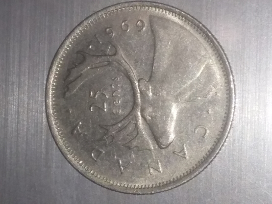 1969-Canadian-Quarter-Thin-Planchette