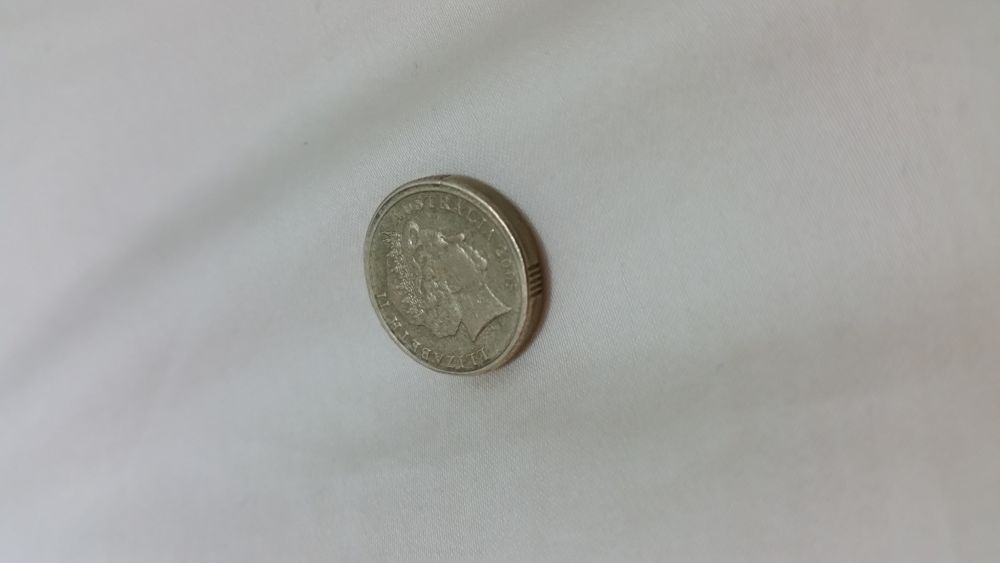 2005-$2-Coin-With-Rim-Error?