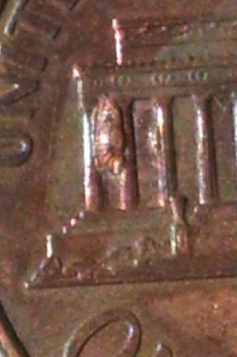 2002-D-Lincoln-Cent--Gas-Bubble-Or-Fragment?