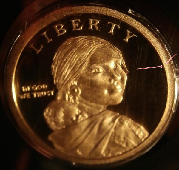 2014-S-Native-American-$1-With-Embedded-Wire-Or-Hair?-On-Rim