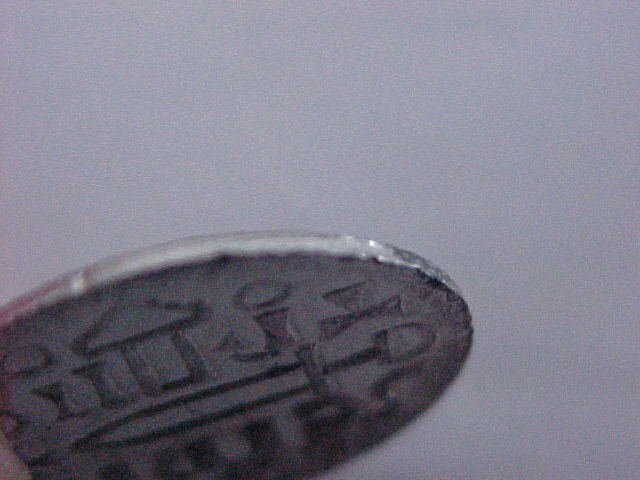 Scripe-With-A-Roman-Short-Sword-ID