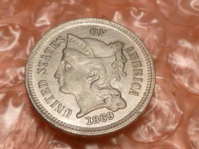 Counterfeit-1869-Three-Cent-Nickel-/-Trime