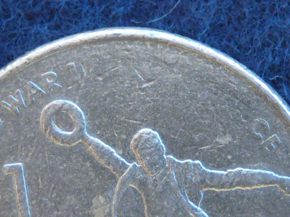 Error-On-2005-$1-And-5c-Coin