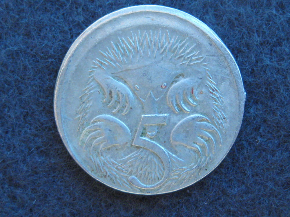 Error-On-2005-$1-And-5c-Coin