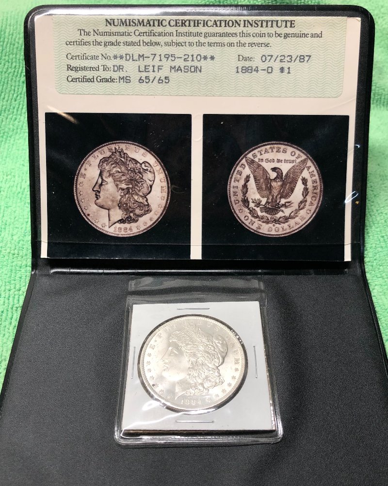 1884-O-Morgan-Guess-The-Grade-And-Grading-Company