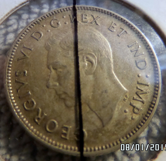 1940-Quarter-With-Die-Rotation->-20%-?
