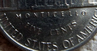 1991-Nickel-With-Strange-M-In-Monticello,-What-Is-It?