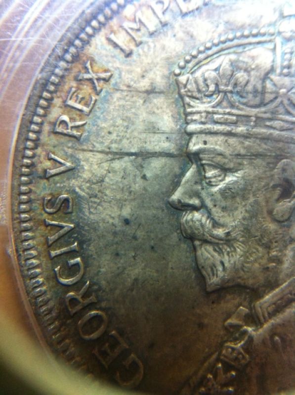 Odd-Toning-On-MS-64-1935-Dollar