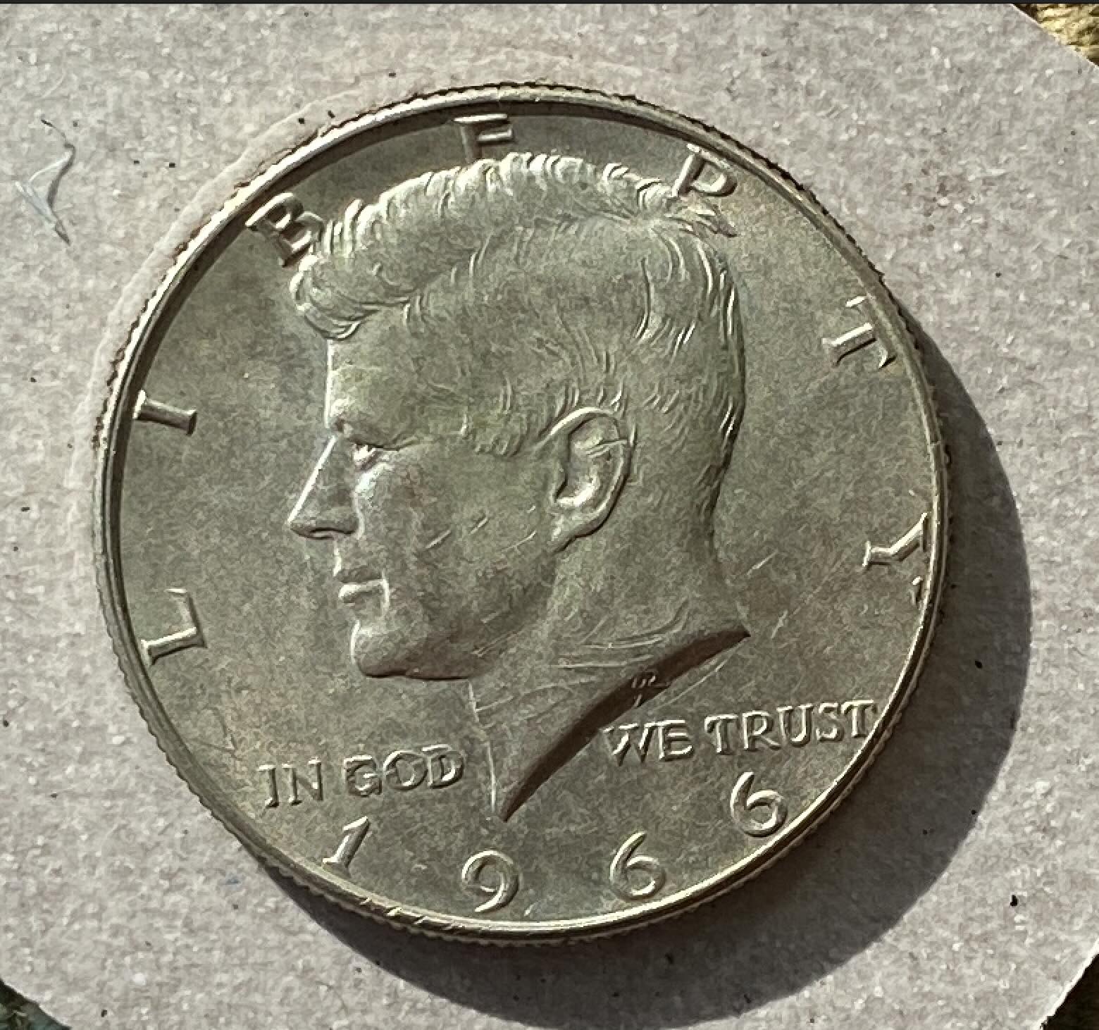 1966-Kennedy-Marks-Across-Neck