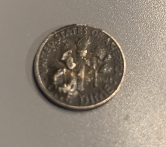 What-Happened-To-This-Coin-?-Or-Is-It-An-Error-?-1977-Philadelphia-Dime