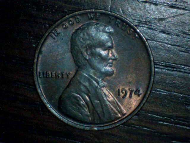 1974-LMC-Wierd-Doubling-On-Reverse-Statue?