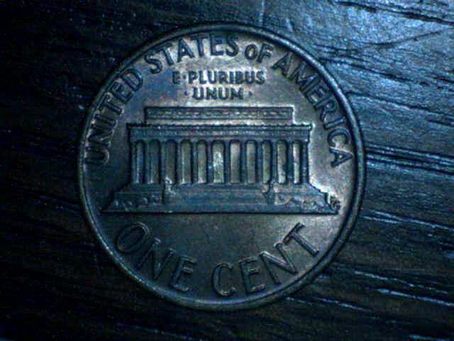 1974-LMC-Wierd-Doubling-On-Reverse-Statue?