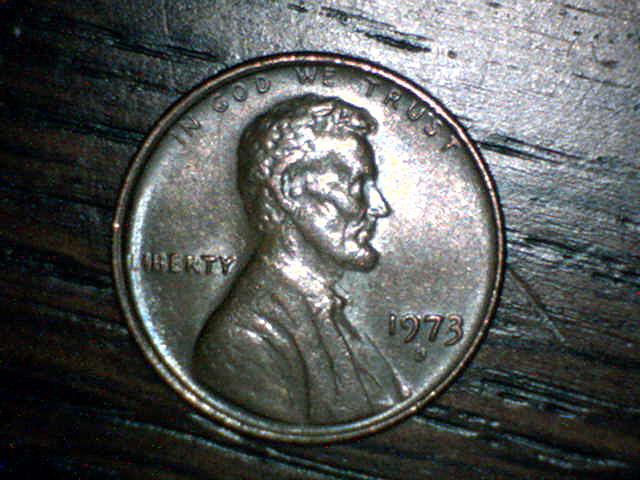 1973-D--Large-Raised-Area.-Die-Dent-Maybe?