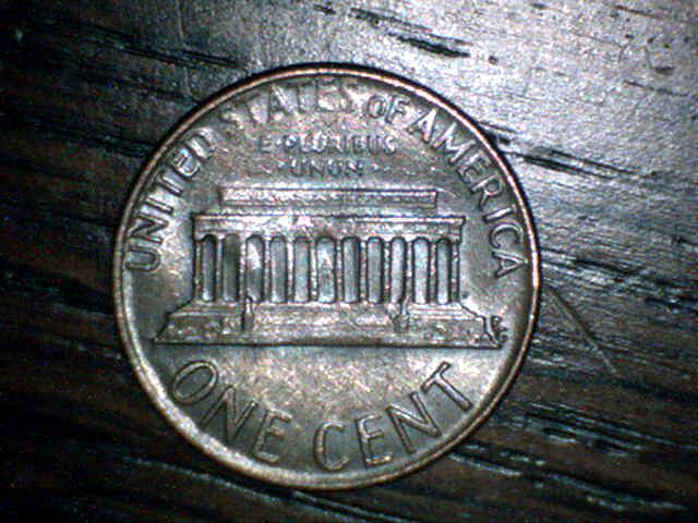 1973-D--Large-Raised-Area.-Die-Dent-Maybe?