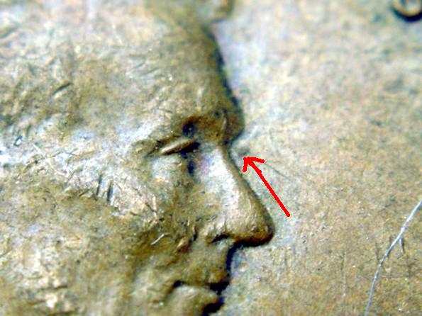 1946-P-LMC---Dot-By-Left-Eyebrow-Area.