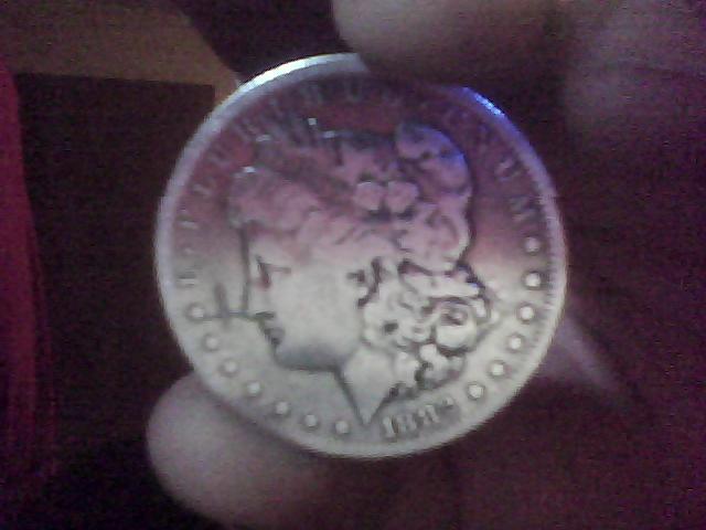 1882-S-Morgan-Silver-Dollar-With-Weird-Marking-Near-The-Nose
