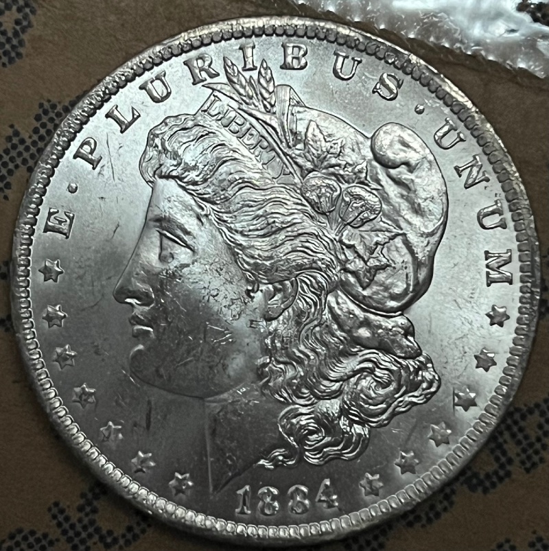 Toned-1884-O-Morgan-Dollar-For-Grading