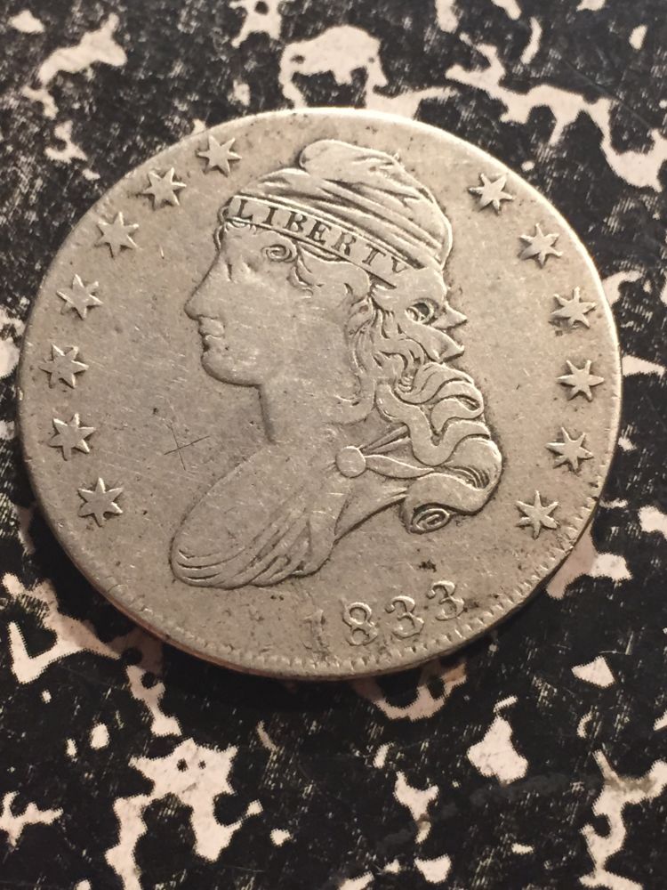 Neat-Contemporary-Counterfeit-1833-Bust-Half