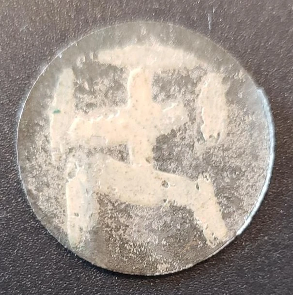 Need-Help-Identifying-The-Writing-On-This-Token?