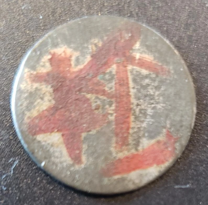 Need-Help-Identifying-The-Writing-On-This-Token?
