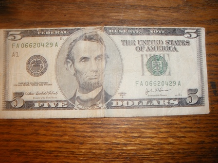 Off-Center-$5