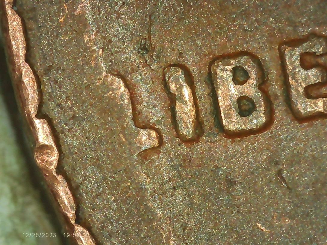 One-Of-Those-Rare-1955-D-Bezel-Cents