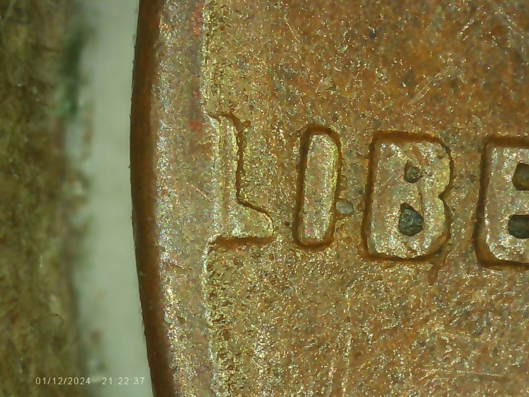 1951-D-Cent-With-L-Connected-To-Rim