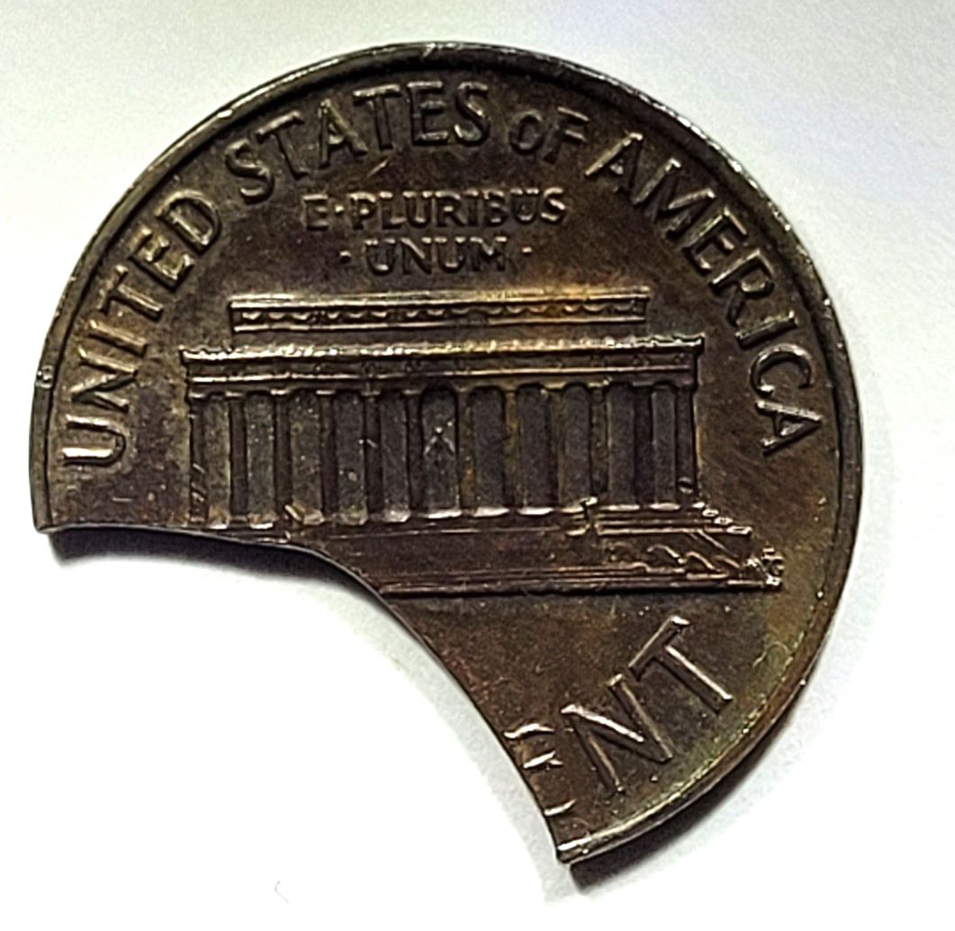 1968-D-Cent.-Looks-Like-A--Hack-Saw-Clip.