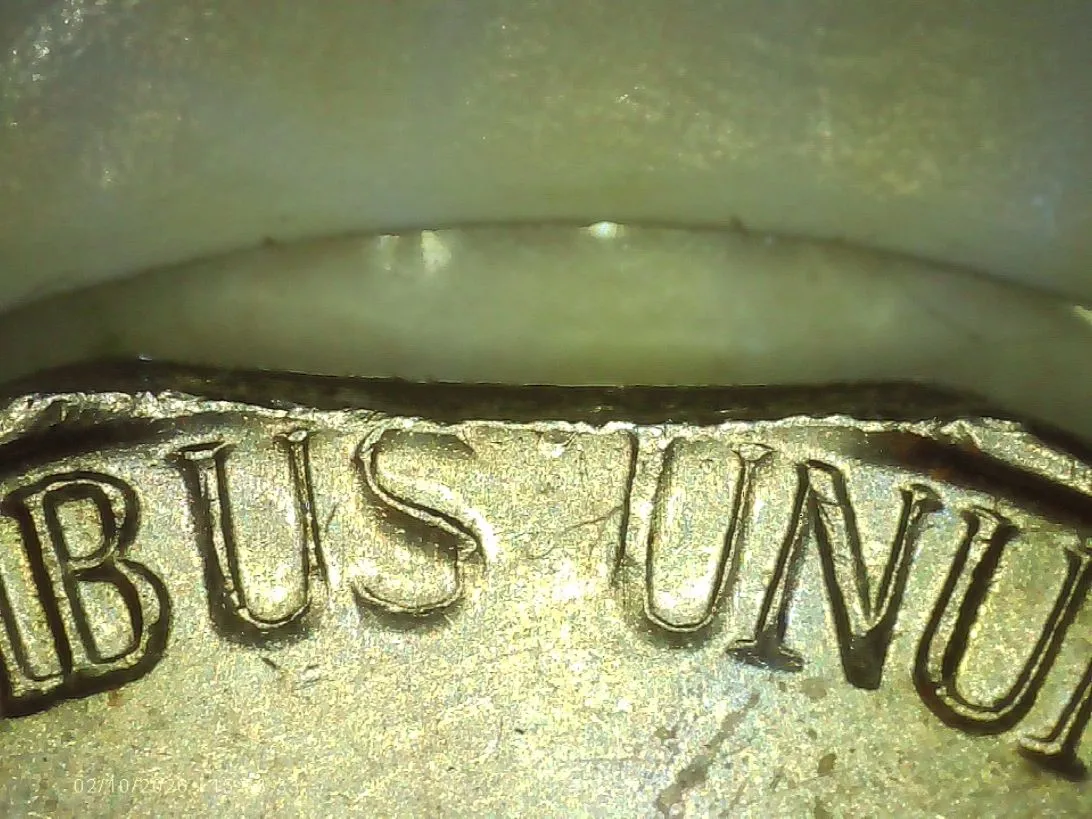 1964-D-Nickel-With-3-Clips?