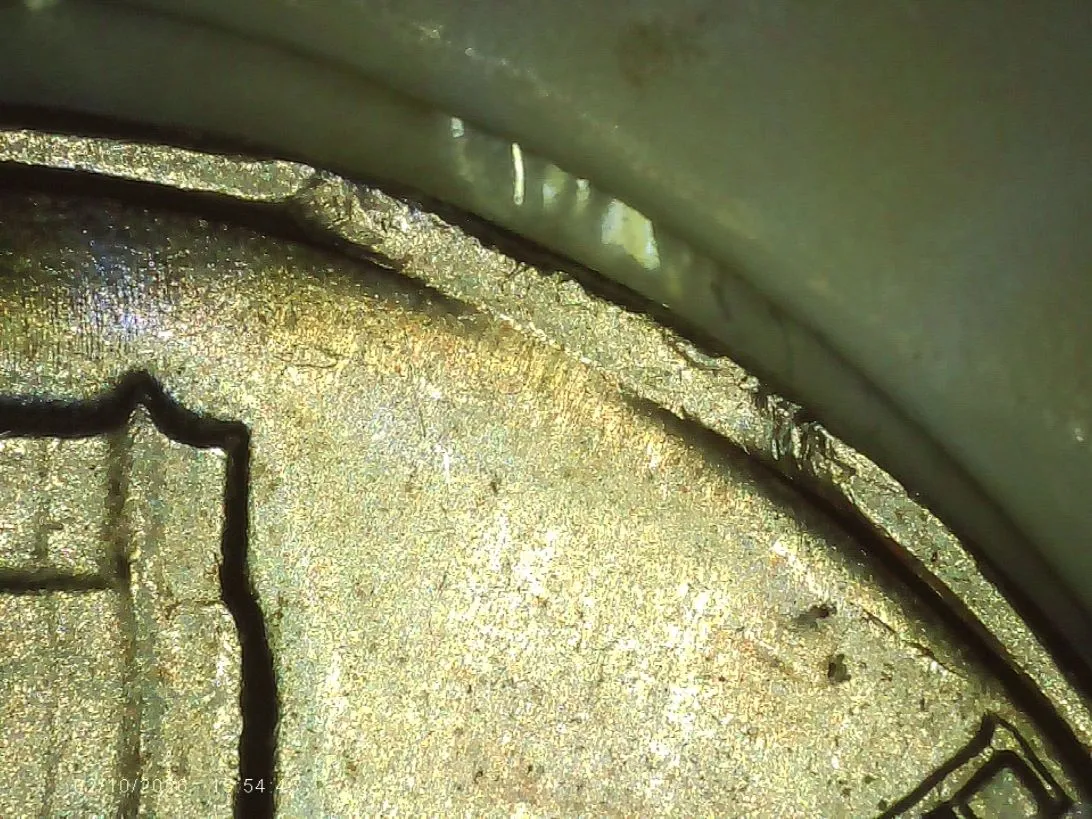 1964-D-Nickel-With-3-Clips?