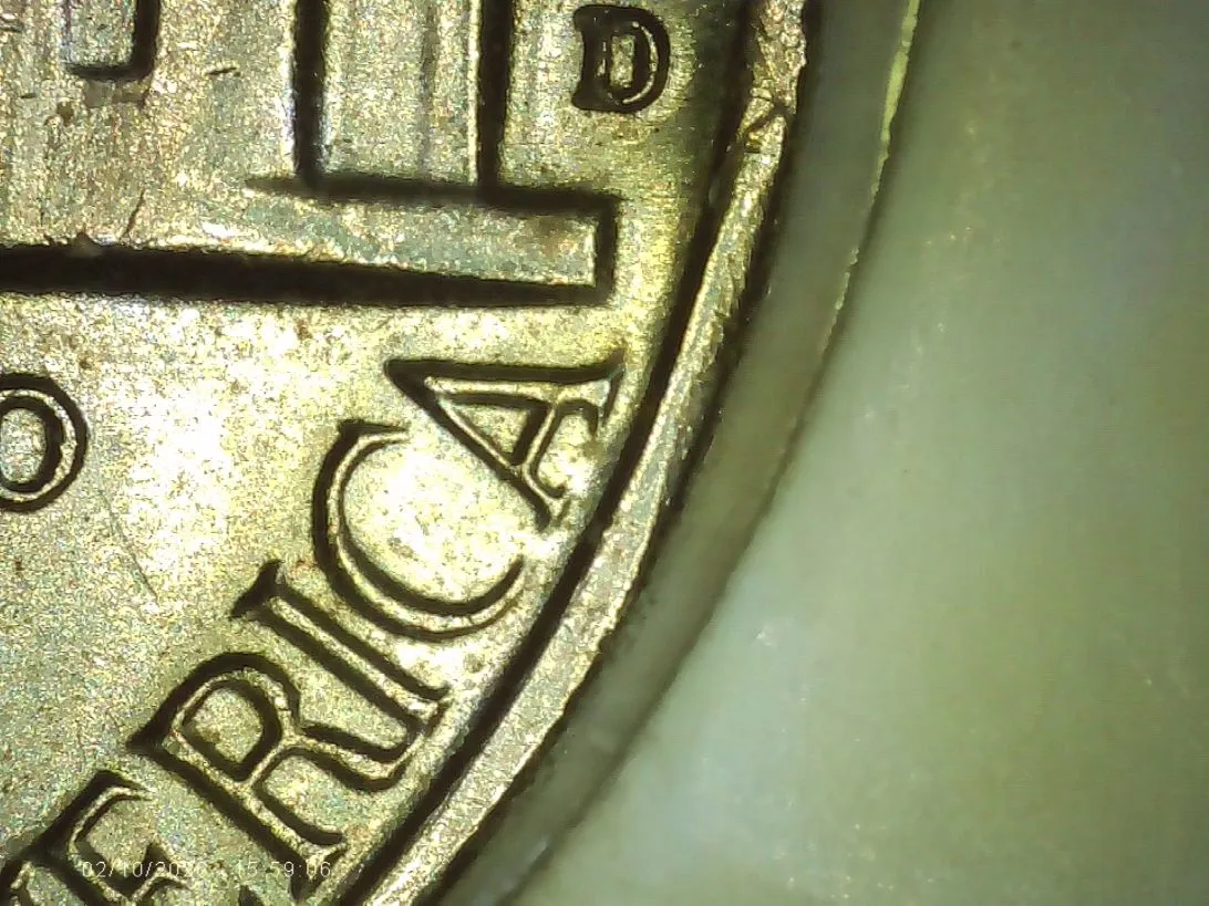 1964-D-Nickel-With-3-Clips?