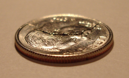 Broken-Die-Dime-And-Texas-Quarter-Pics