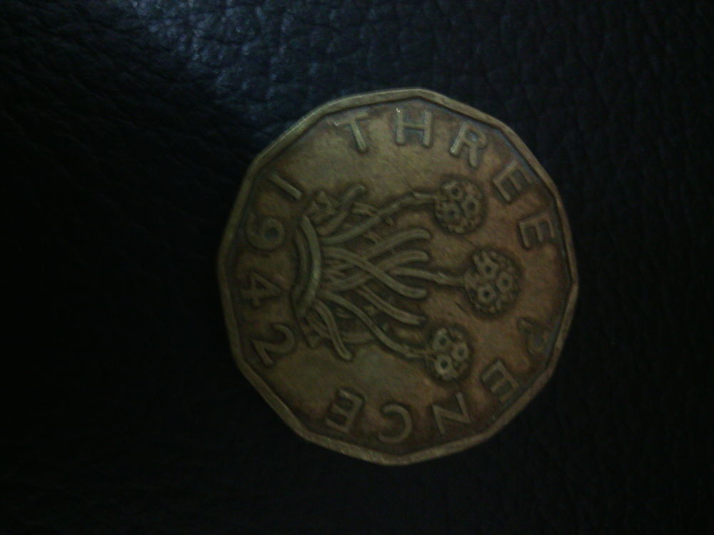 1942uk-Three-Pence-With-One-Side-Like-Bottle-Cap-Mint-Error?