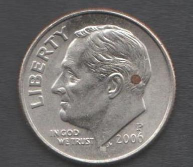 2006-Dime-With-Copper-Circle-Behind-Ear