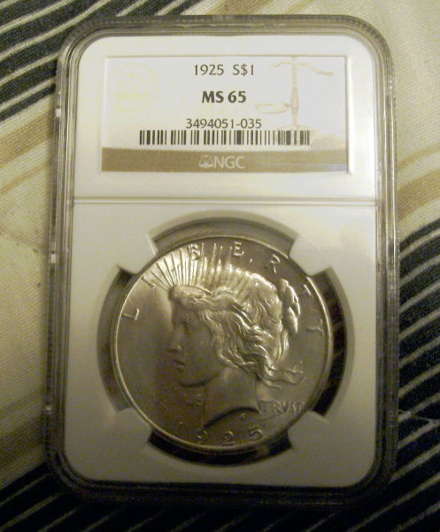 1925-P-Peace-Dollar.-You-Vs-NGC