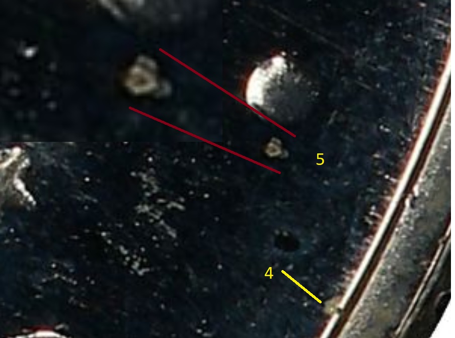 Question-On-Non-Design-Letters/Numbers-Sometimes-Appearing-On-Coins
