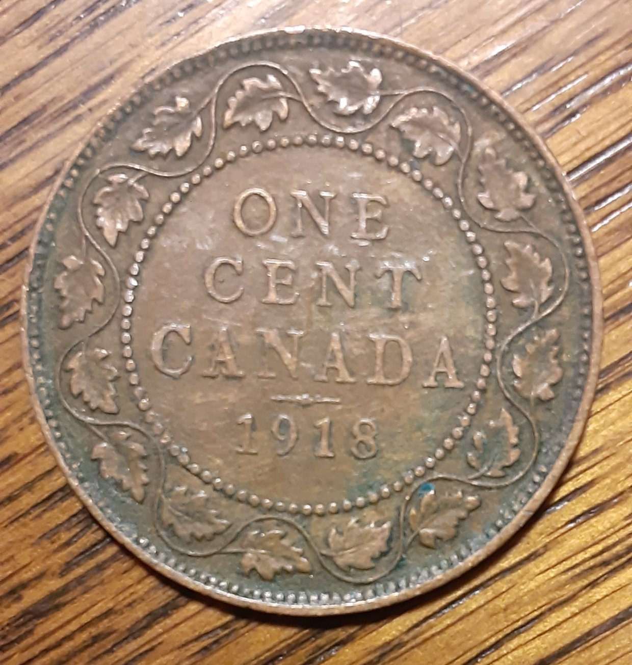 Canadian-1918-Large-Cent-With-PVC-Damage?