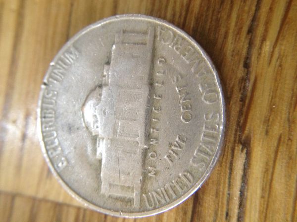 1954-Nickle,-Plastic-Clunking-Sound?
