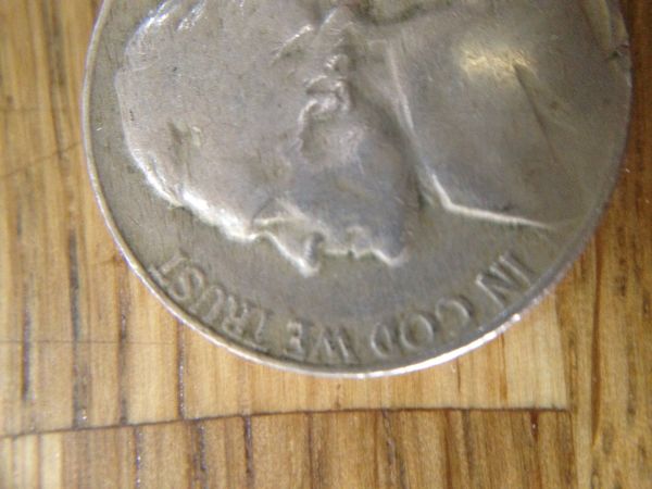 1954-Nickle,-Plastic-Clunking-Sound?