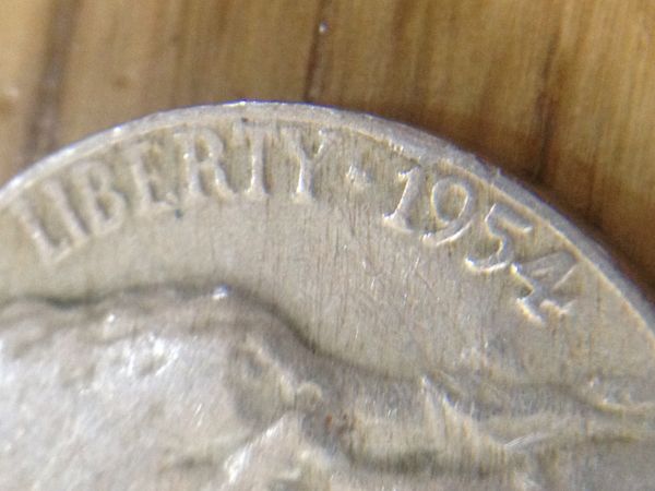 1954-Nickle,-Plastic-Clunking-Sound?