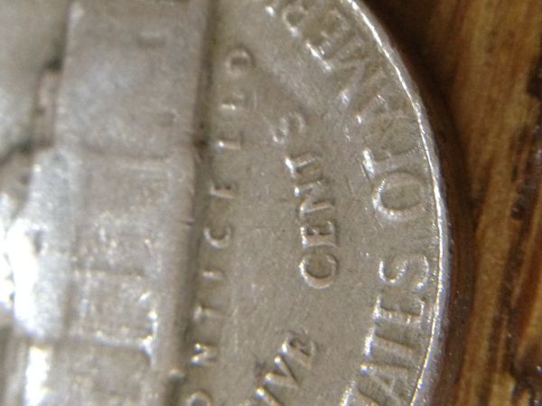 1954-Nickle,-Plastic-Clunking-Sound?