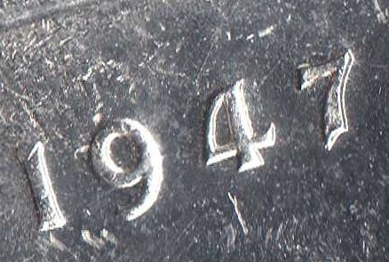 1947-Double-Date-Silver-Dollar?