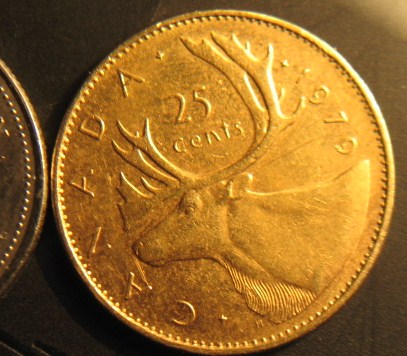 Any-Idea-What-Caused-This-Clad-25-Cents-To-Tone-A-Odd-Colour