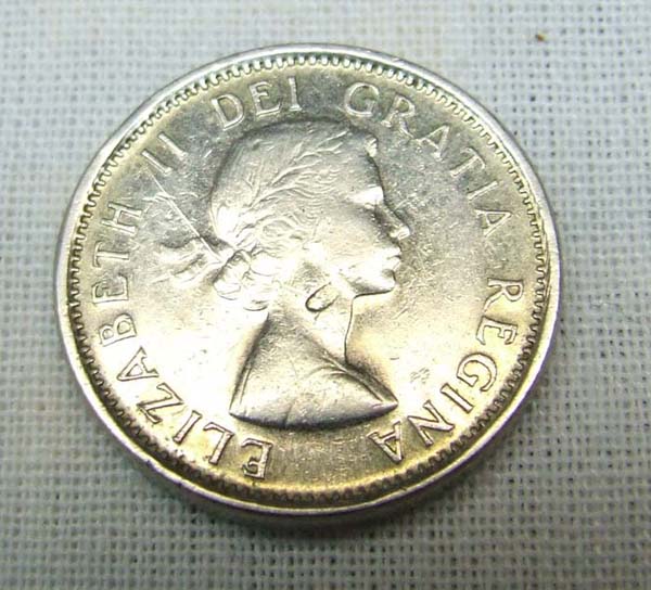 1957-1-Cent-Struck-On-Wrong-Planchet?