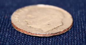 Possible-Roosevelt-Dime-On-A-Foreign-Planchet